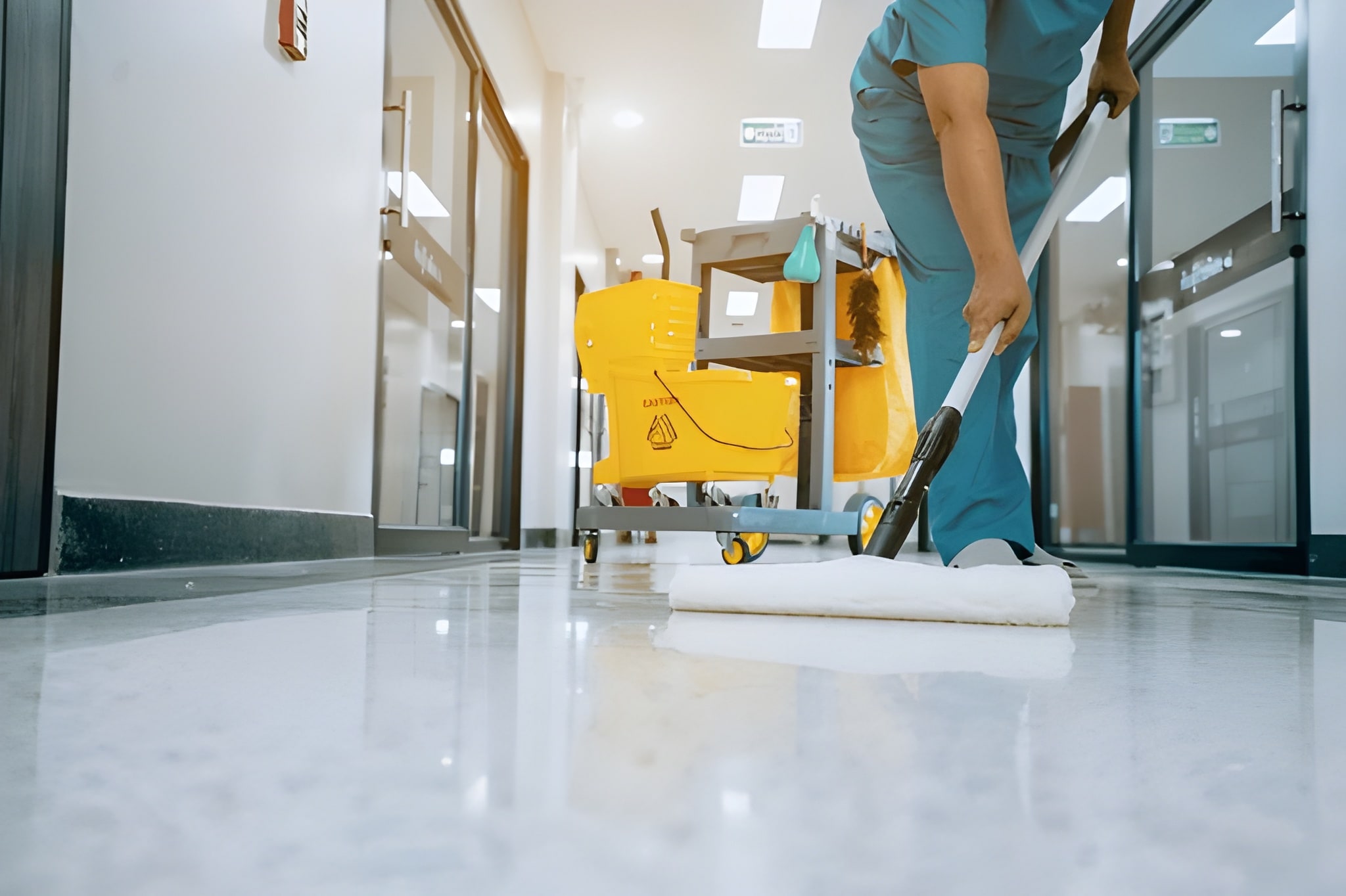 Hospital Cleaning 11 Cleaner mopping tiled hospital floor